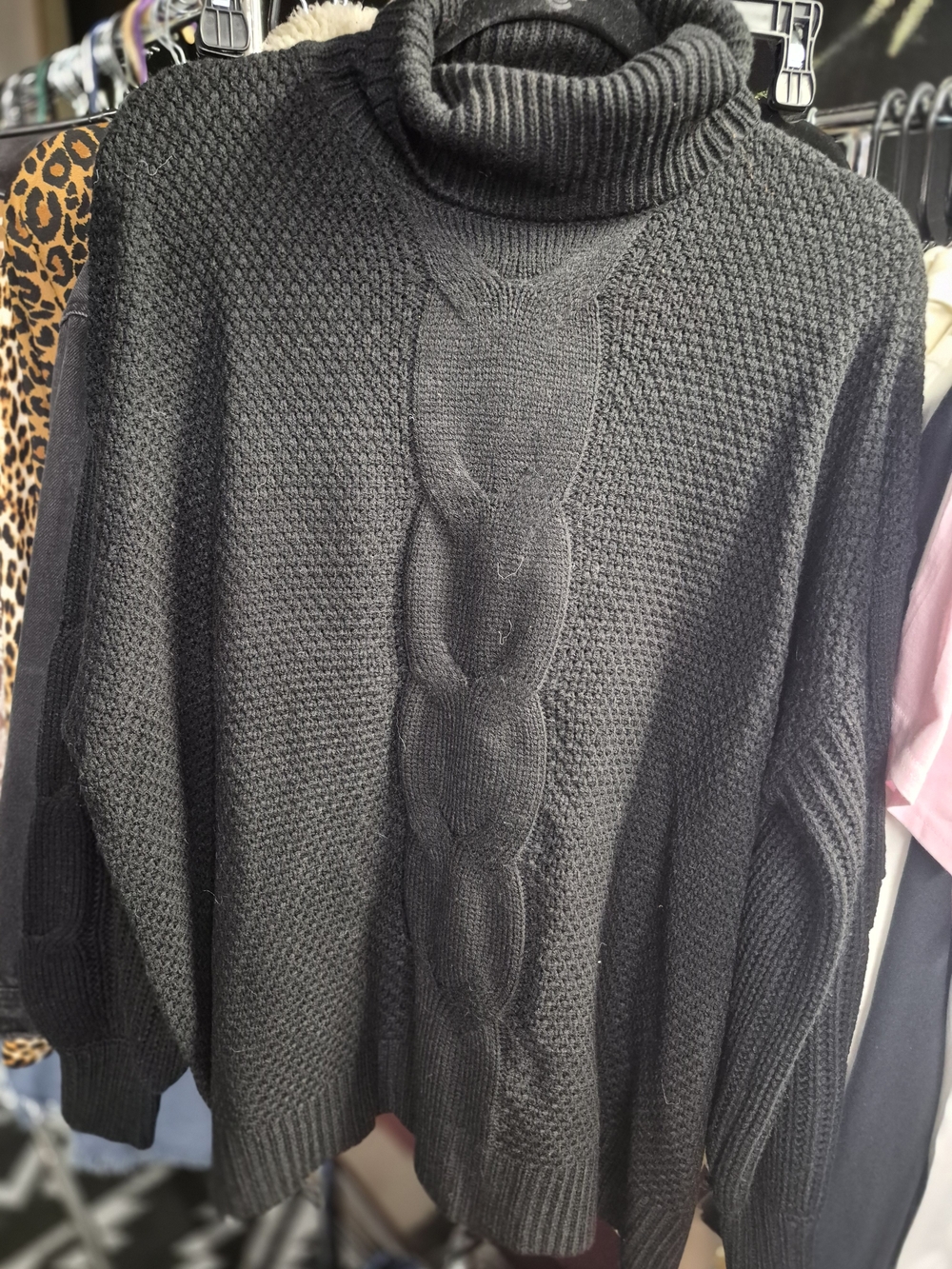 Cozy Black Cable-Knit Turtleneck Sweater